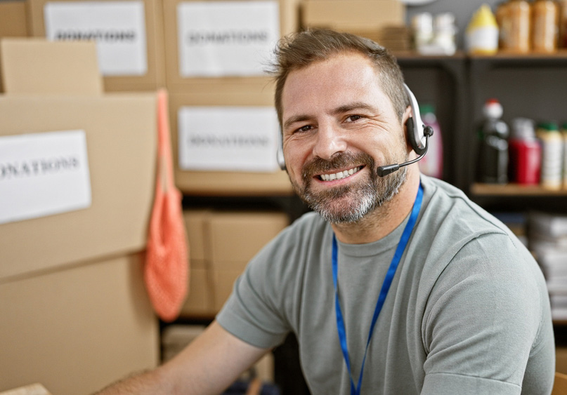 friendly order serviceman taking an order on phone from customer Airdrie.