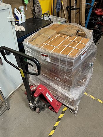 pallet-jack loaded with product ready to ship to Banff.