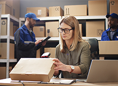 busy stockroom with workers preparing parts to be shipped to the Swift Current area.